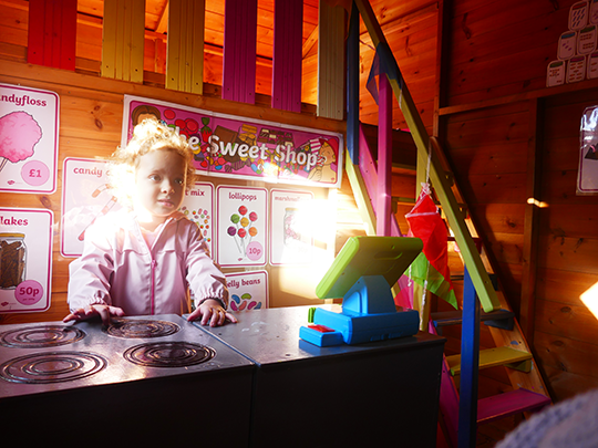 Child playing as a shopkeeper